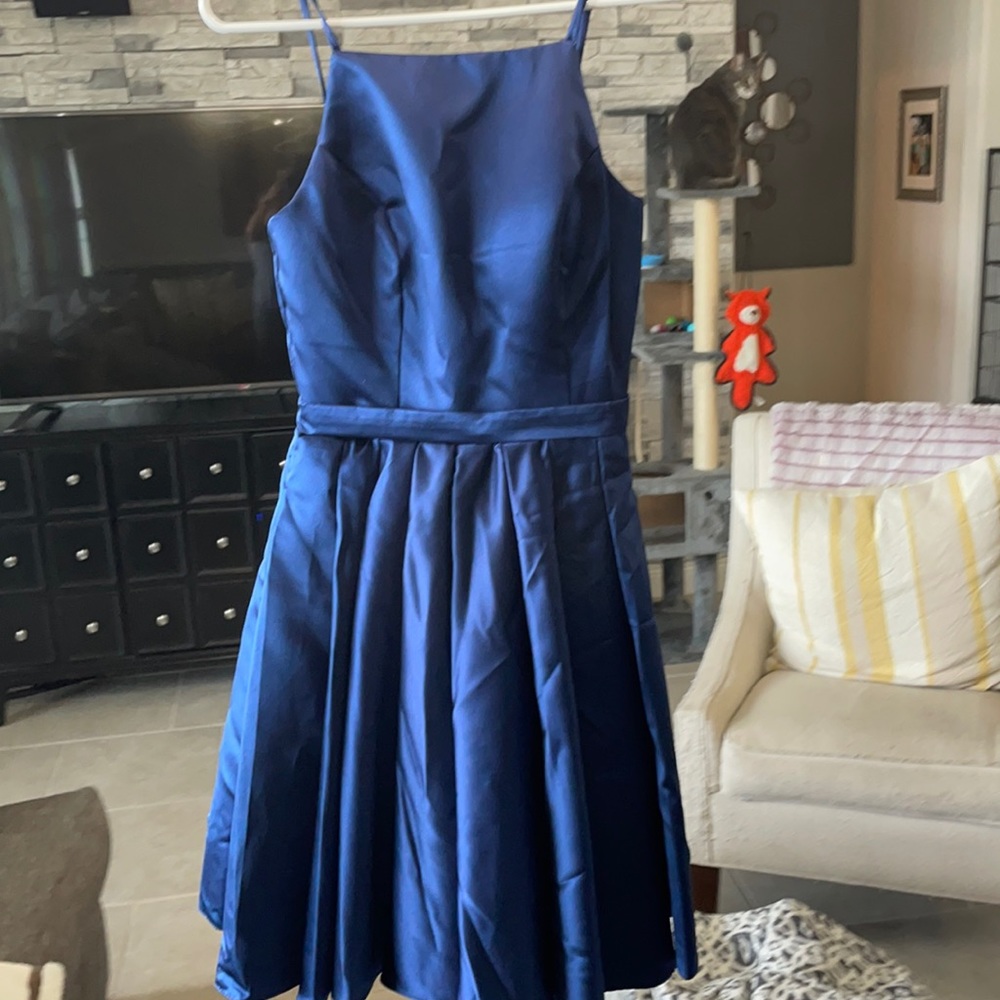 Never worn. Wedding dress brand size 2.